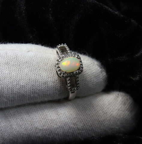 art deco opal halo ring